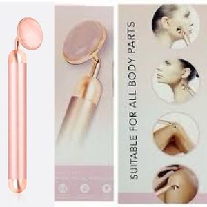 Luxe + Willow Bio Phoenix Rose Quartz Vibrating Facial Massager.